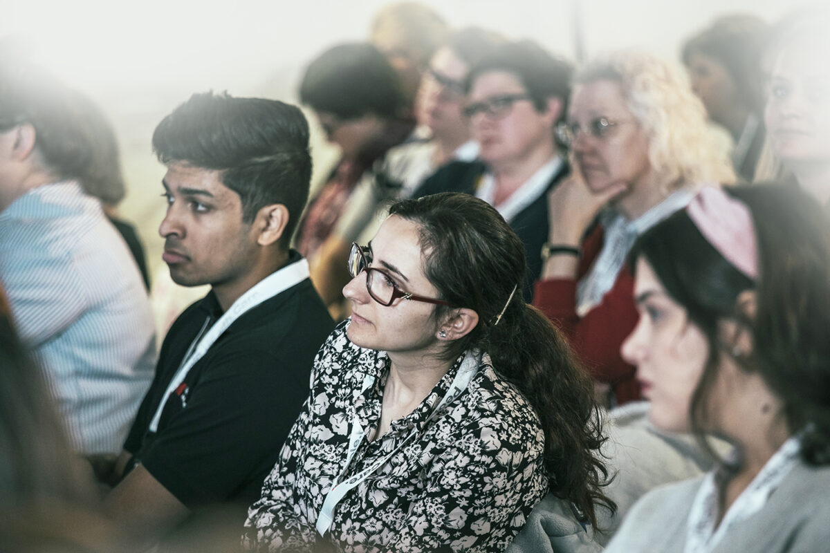 Audience clapping at the annual conference | the society of tissue viability